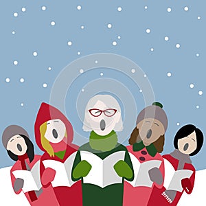 Female christmas carol singers in the snow