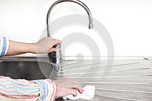 Female Cleaning Kitchen