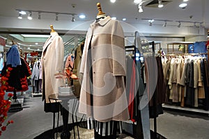 Female clothing shop interior mannequins photo