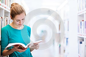 Female college student in a library