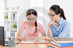 Female college student preparing school exam