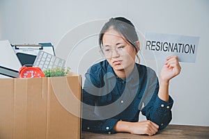 Female company employee stressed and fed up after quitting her job