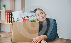 Female company employee stressed and fed up after quitting her job to look for a new job, fired or was fired by the employer