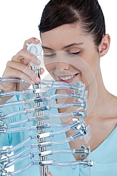 Female computer engineer holding computer cable