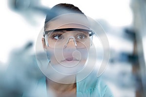 Female computer engineer repairing computer motherboard
