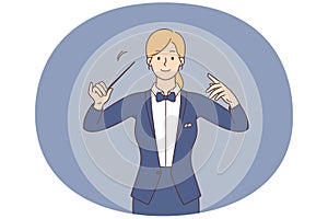 Female conductor with baton in hands