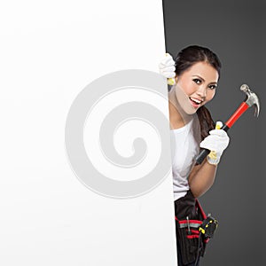 Female construction worker in action