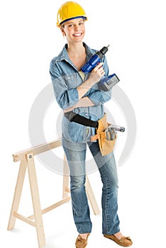 Female Construction Worker With Drill Standing By Work Horse