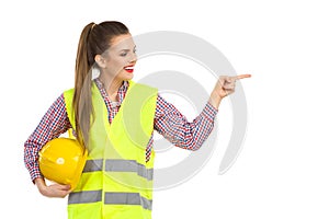 Female Construction Worker Pointing