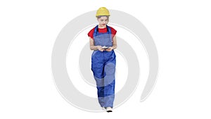 Female constuction worker counting money while walking on white background.