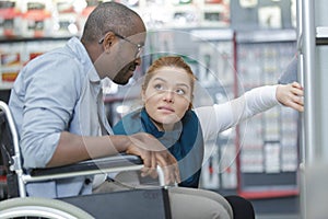 female consultant talking to customer in orthopaedic store