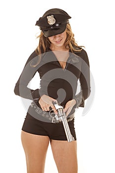 Female cop holding a revolver