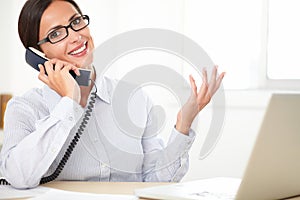 Female corporate executive talking on the phone