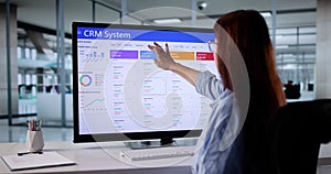 Female Corporate Manager Using CRM Software