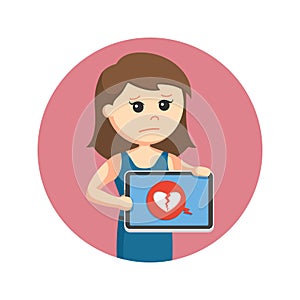 Female couple standing with broken heart on tablet