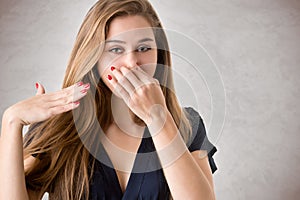 Female Covering Her nose