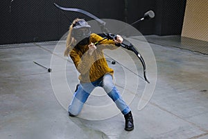 Female with crossbow arrows bow. The Archer takes aim, sharpshooter. Crossbow club