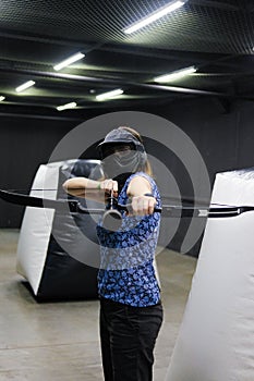 Female with crossbow arrows bow. The Archer takes aim, sharpshooter. Crossbow club