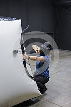 Female with crossbow arrows bow. The Archer takes aim, sharpshooter. Crossbow club