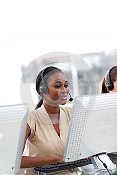 Female customer service agent with headset on