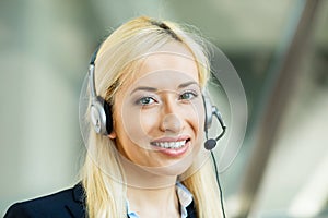 Female customer service representative on hands free device