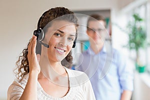 Female customer service representative wearing headset
