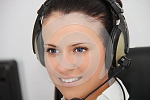 Female customer support operator with headset