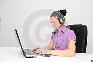 Female customer support operator with headset