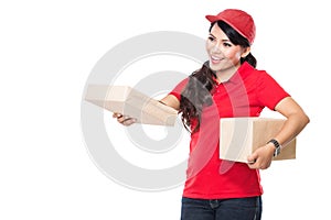 Female delivery service happily delivering package to costumer photo