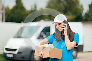 Female Delivery Worker Holding Cardboard Box Package