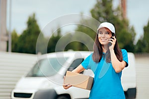 Female Delivery Worker Holding Cardboard Box Package