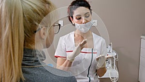 Female dentist finish treatment and give recommendations to patient