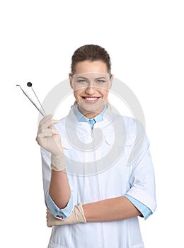 Female dentist holding professional tools photo