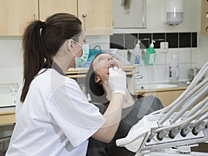 Female dentist and patient