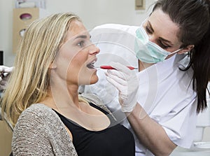 Female dentist and patient