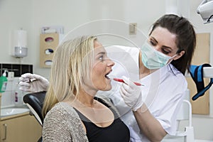 Female dentist and patient