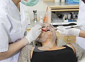 Female dentist and patient