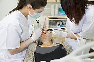 Female dentist and patient