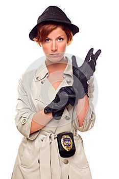 Female Detective with Badge Putting on Gloves