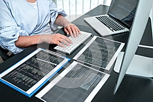 Female Developer programmer working on coding program software computer, Writing website and development database technology in