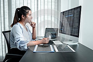 Female Developer programmer working on coding program software computer, Writing website and development database technology in