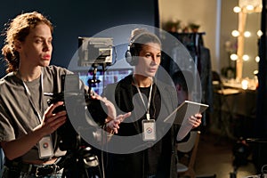 Female Director Giving Instructions To Crew