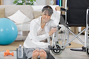female disable woman in physical rehabilitation therapy