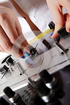 Female DJ playing music photo