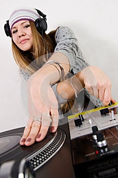 Female DJ scratching the record