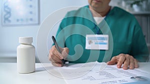 Female doc filling patient medication form, wearing off glasses, pharmaceuticals