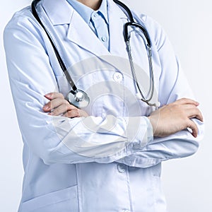 Female doctor body part with hand gesture, young woman physician with stethoscope  on white background, close up, cropped