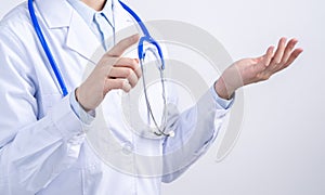 Female doctor body part with hand gesture, young woman physician with stethoscope  on white background, close up, cropped