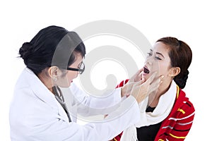 Female doctor checking patient health