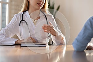 Female doctor discuss results with patient in hospital